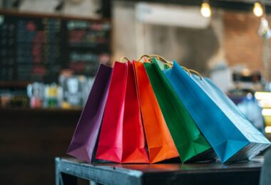 colorful-paper-bags-placed-table